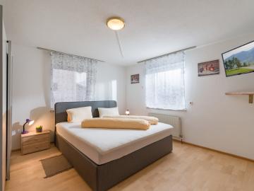 images/Alpen_Apart/bilder/Alpen_Apart_Schoeffstallstrasse_7_Fuegen_Schlafzimmer.jpg