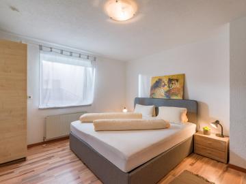 images/Alpen_Apart/bilder/Alpen_Apart_Schoeffstallstrasse_7_Fuegen_Schlafzimmer_1.jpg