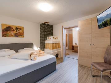 images/Alpen_Apart/bilder/Alpen_Apart_Schoeffstallstrasse_7_Fuegen_Schlafzimmer_2.jpg